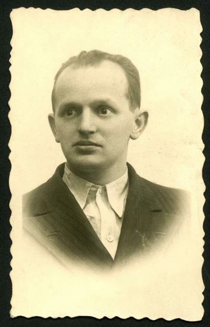 Nusyn Estrajcher front